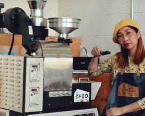 Hai Nguyen, the founder of The Shed Coffee, roasts coffee at her micro-roastery in Charlottetown, PEI. 